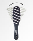 The Flex Brush Petite in black to detangle wet hair