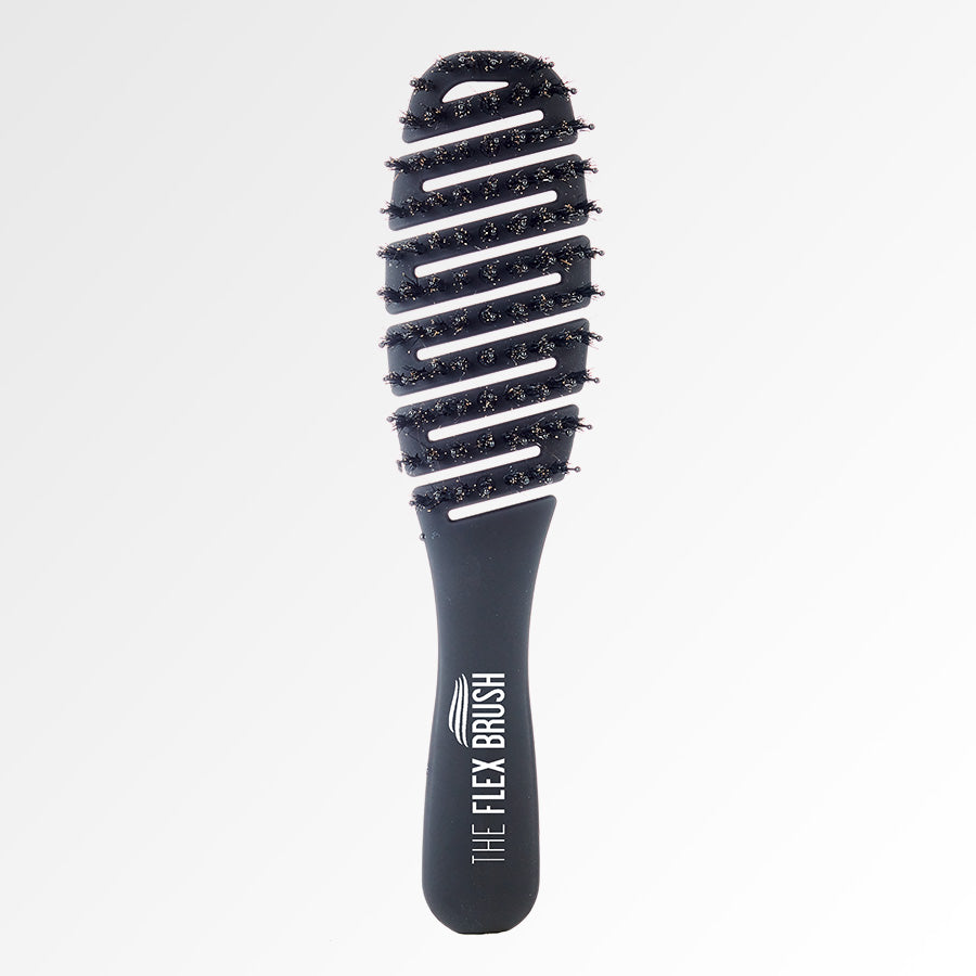 The Flex Brush Petite in black to detangle wet hair