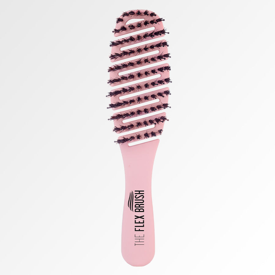 The Flex Brush Petit in pink to detangle wet or dry hair
