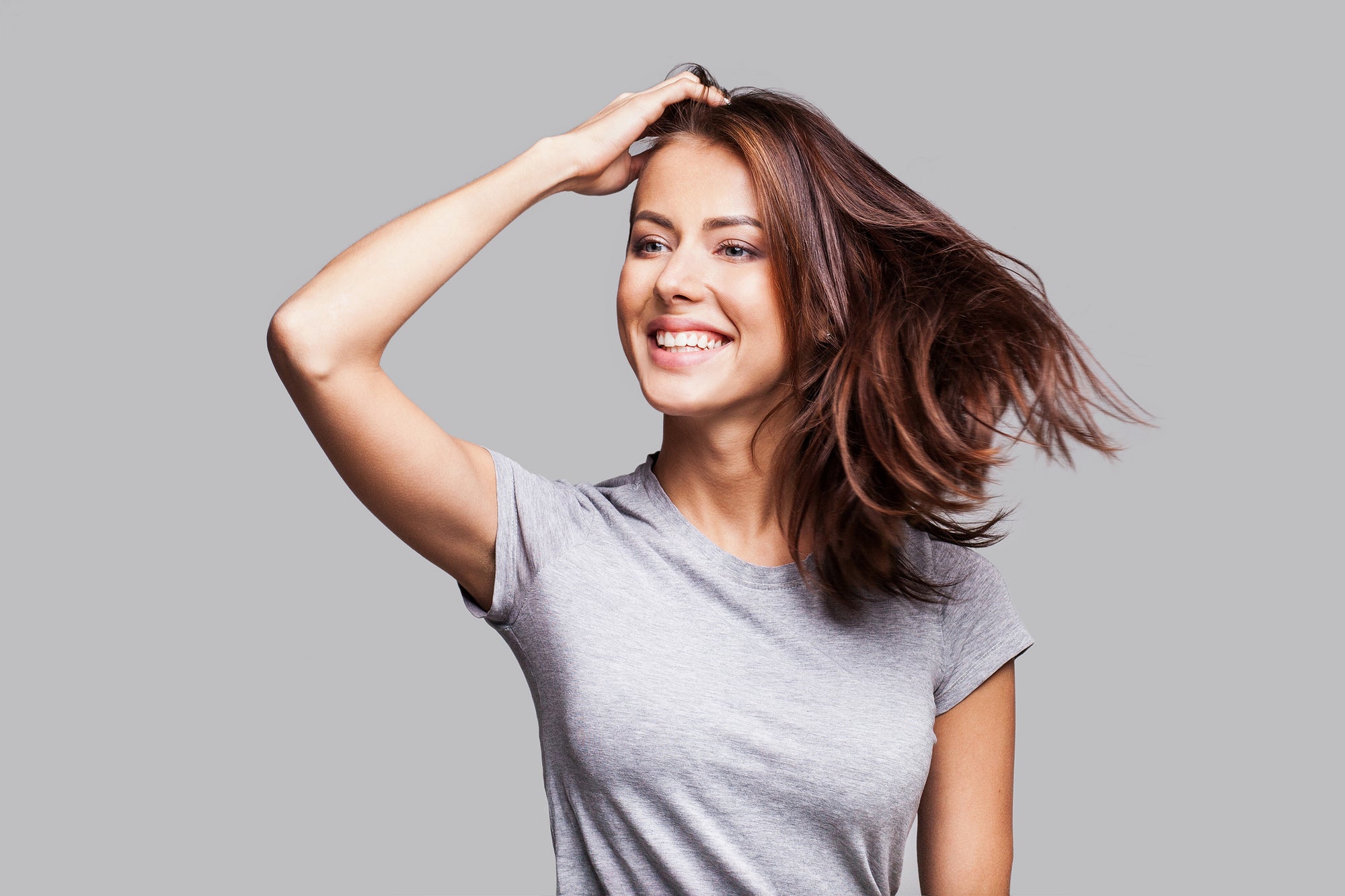 Woman with beautiful hair and healthy scalp thanks to capilia